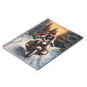 英国のセッタードッグにオートバイクリスマスに乗る ノートブック (左側)