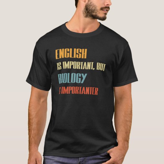 英語は重要だが生物学は重要だ Tシャツ (正面)