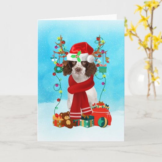 英語スプリンガー・スパニエルが雪の中でクリスマスプレゼント カード (黄色い花)