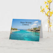 茅葺き小屋の写真と風光明媚な熱帯ビーチ カード (黄色い花)