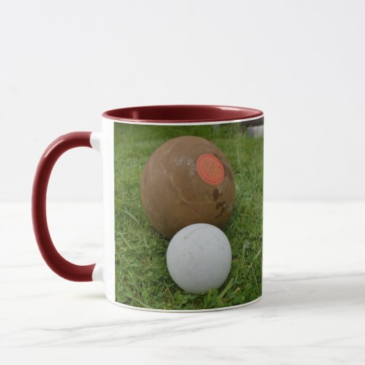 茶色いヴィンテージの芝生鉢とジャック マグカップ (左)