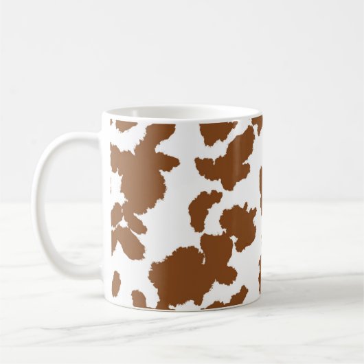 茶色と白の牛の毛の隠れパターン コーヒーマグカップ (左)