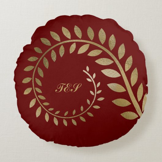 茶色に対して金ゴールドの様式化されたカールしたスパイラルシダ ラウンドクッション (正面)