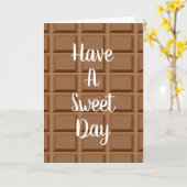 茶色のチョコレートの板のような模様 カード (黄色い花)