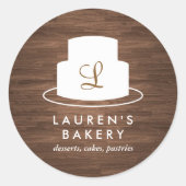 茶色の木目に白いケーキのモノグラムのロゴ ラウンドシール (正面)