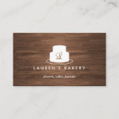 茶色の木目に白いケーキのモノグラムのロゴ 名刺 (正面)