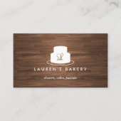 茶色の木目に白いケーキのモノグラムのロゴ 名刺 (正面)
