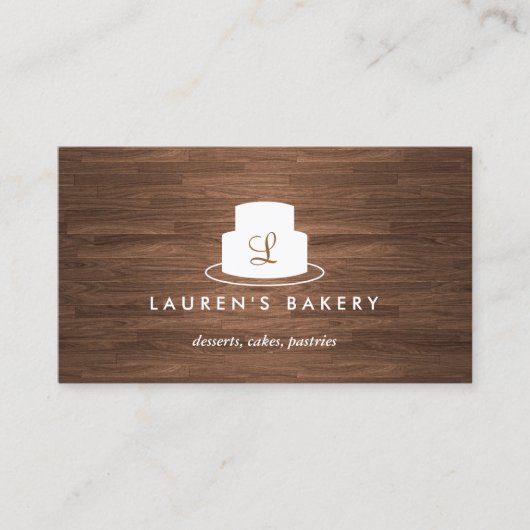 茶色の木目に白いケーキのモノグラムのロゴ 名刺 (正面)
