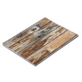 茶色の木製ボードのクローズアップ写真 ノートブック (左側)