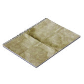 茶色の紙のしわ。紙に折り目を付けるバックグラウンド ノートブック (左側)