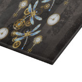 茶色の背景にスチームパンクストライプのトンボ カッティングボード (角)