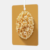 茶色の背景にポップコーンの円 メタルオーナメント (正面左)