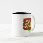 茶色の背景に描かれた牧歌的な花のデザイン ツートーンマグカップ (正面右)
