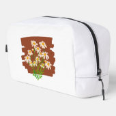 茶色の背景に描かれた牧歌的な花のデザイン ドップキット (右コーナー)