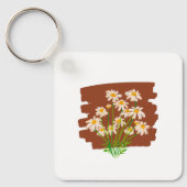 茶色の背景に描かれた牧歌的な花柄 キーホルダー (正面)