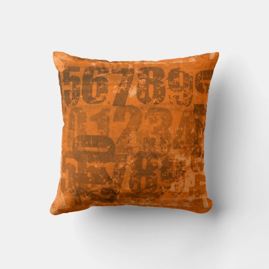 茶色はっきりしたがかったオレンジ色のテクスチャーの大きなグランジ数 クッション (裏面)