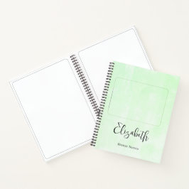 草のかわいらし中に寝そべる茶色の馬 ノートブック