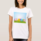 草の中のカラフルなイースターエッグ Tシャツ (正面)
