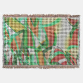 草の写真の上に編まれたバスケットのように見える スローブランケット (正面)