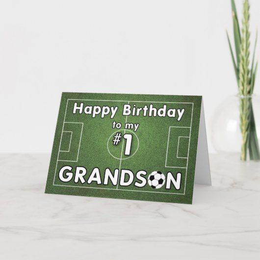 草の原とボールを持つサッカーの孫誕生日 カード (正面)