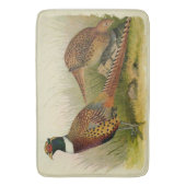 草の原の中のリングや輪の首飾りキジ バスマット (正面縦)