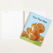 草の青い空にどんぐりを持ったかわいい赤リス プランナー手帳 (ディスプレー)