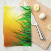 草原に広がる美しい日の出 キッチンタオル (四つ折り)