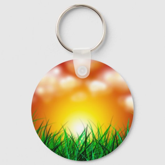 草原に広がる美しい日の出 キーホルダー (正面)