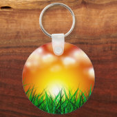 草原に広がる美しい日の出 キーホルダー (正面)