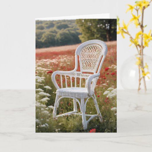 草地の白い籐の椅子 カード (黄色い花)