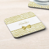 華やかな白と金ゴールドのゼブラのプリント コースター (左側)