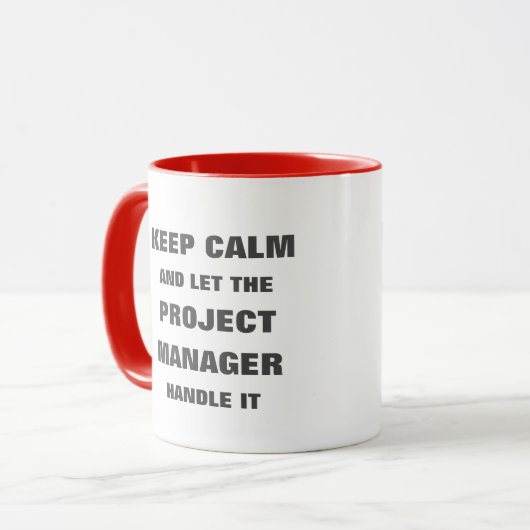 落ち保着いてプロジェクト管理者に任せる マグカップ (正面左)