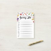 落書きされたチェックボックスの食料雑貨のリスト ポストイット (デスク上)