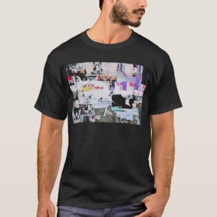 落書きの壁のBanksyのスタイルによって引き裂かれる紙 Tシャツ