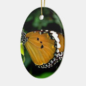 葉にオレンジ、黒、白の蝶 セラミックオーナメント (左)