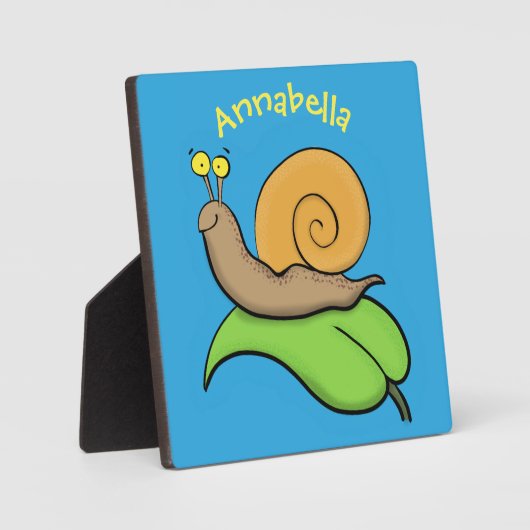 葉の漫画の上の可愛い、幸せなカタツムリイラストレーション フォトプラーク (正面)