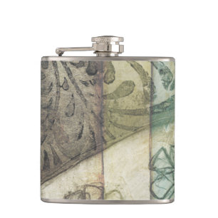 葉、花および草が付いている庭のパネル フラスク