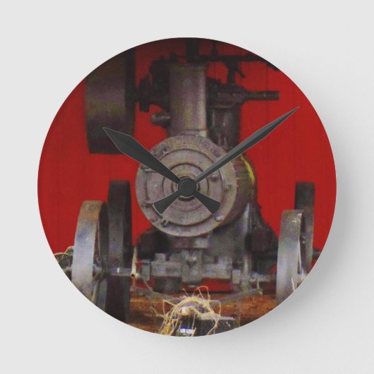 蒸気によって動力を与えられる旧式なTracter ラウンド壁時計 (正面)