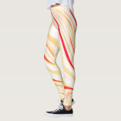 薄いベージュのトーン、赤いピンクのカーブを持つ波状の布 レギンス (左)