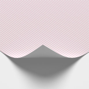薄い淡いピンクおよび白のストライプの包装紙 ラッピングペーパー
