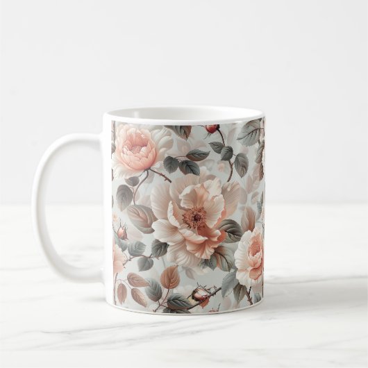 薄い灰色に灰色葉の花を付けたクリーム コーヒーマグカップ (左)