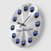 薄い青い線の星印ボタン ラージ壁時計 (傾斜)