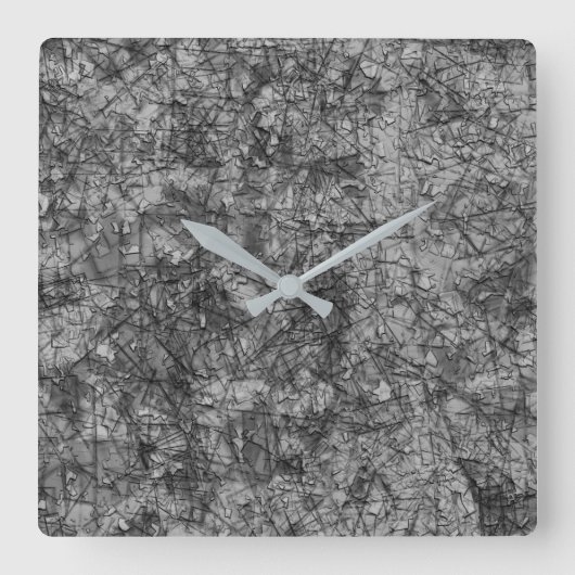 薄く斑点のある灰色と黒の肌をした スクエア壁時計 (正面)