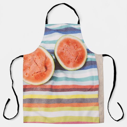 薄切りのスイカの実を布に写した写真を閉じる エプロン (正面)