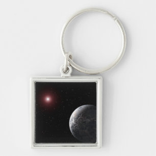 薄暗い星の周りを回る氷の多い惑星 キーホルダー