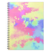虹のペイントスプラッター効果 黄色 ピンク 青 ノートブック (正面)