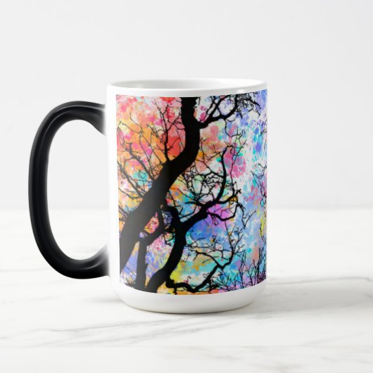 虹の水色の空、黒いシルエットの木 モーフィングマグカップ (左)