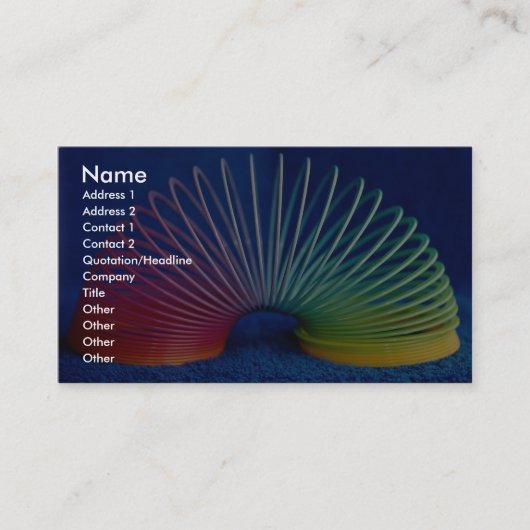 虹色のしなやかで優雅なおもちゃ 名刺 (正面)