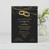 虹色のスパークリングライトとゴールドの結婚指輪 (スタンド正面)