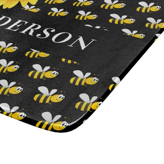 蜂の黒黄ヒマワリの苗字 カッティングボード (角)